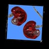 red custom made classic ear micro monitor on blue and black background