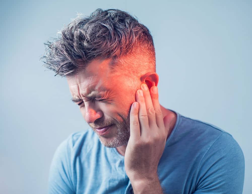 Middle aged man affected by tinnitus