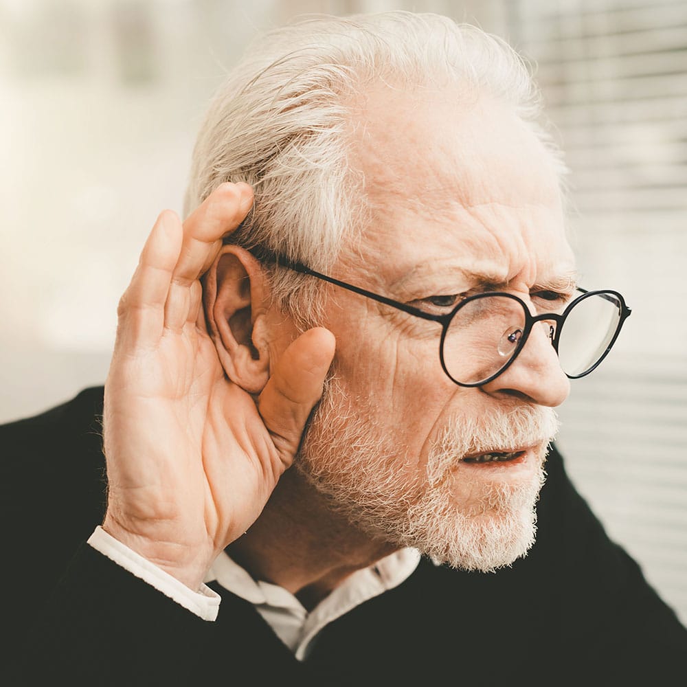 Senior man with hearing loss