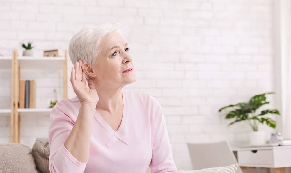 Senior woman with hearing loss