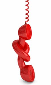 Illustration of red telephone with cord wrapped up in itself on white background