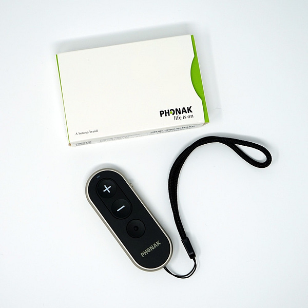 Birds eye shot with phonak remote control and packaging
